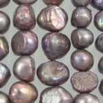 Close-up iridescent purple baroque pearls