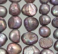 Close-up iridescent purple baroque pearls