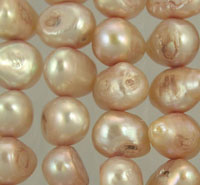 Peach baroque freshwater pearls close-up