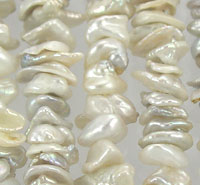 Strands of irregular white baroque pearls