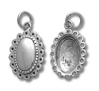 Two oval scalloped silver pendant bezels