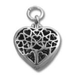 Silver heart locket with intricate filigree cutouts