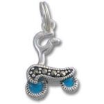 Silver roller skate charm with blue wheels