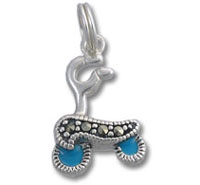 Silver roller skate charm with blue wheels