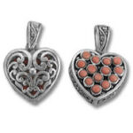 Silver heart pendants with red gemstone inlay