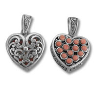 Silver heart pendants with red gemstone inlay