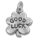 silver four-leaf clover charm saying Good Luck