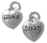 Two heart charms engraved with LOVE and HOPE