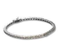 Sparkling silver tennis bracelet on white background