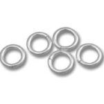 Five silver metal jump rings