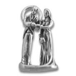 silver bride and groom figurine under arch