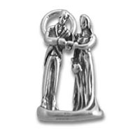 silver bride and groom figurine under arch