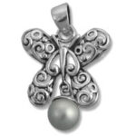 Ornate silver angel pendant with pearl