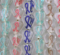 Rows of colorful awareness ribbon glass charms
