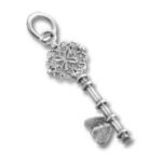 Ornate silver key pendant with heart charm