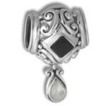 Silver filigree charm with black stone and teardrop