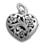 Heart-shaped silver locket with floral filigree