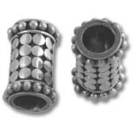 Two decorative silver tube beads with raised dots
