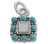Silver pendant with central white stone, turquoise beads