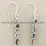 Silver dangle earrings with four oval stones