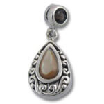 Silver filigree teardrop pendant with brown stone
