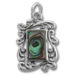 Ornate silver pendant with abalone shell