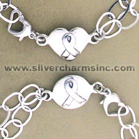 Silver chain bracelet with heart ribbon clasp