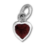 Silver heart pendant with red gemstone