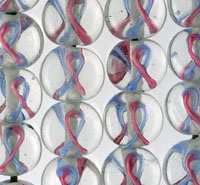 Glass marbles with red and blue swirls