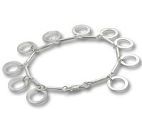 Silver bracelet with dangling circular hoop charms