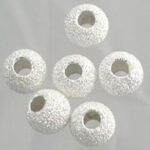 White textured round craft beads with holes