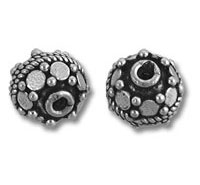 Pair of ornate silver textured round beads