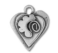 Silver heart pendant with dove and spiral design