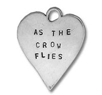 Heart pendant stamped "AS THE CROW FLIES