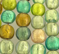 Close-up of green and gold glass pebbles