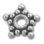 silver star-shaped spacer bead with dots