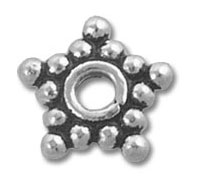 silver star-shaped spacer bead with dots