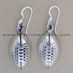 Silver football charm dangle earrings