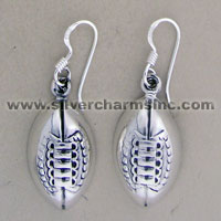 Silver football charm dangle earrings