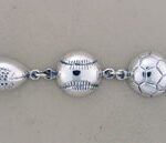 Silver bracelet with sports ball charms