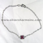 Silver chain bracelet with square pink ribbon charm