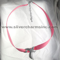 Pink ribbon choker with silver charm