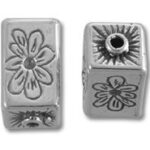 Silver rectangular beads with floral designs