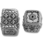 Two ornate silver rectangular beads