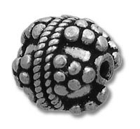 Ornate silver bead with raised granulated dots