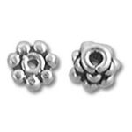 Two small silver flower spacer beads