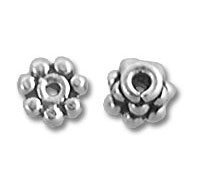 Two small silver flower spacer beads