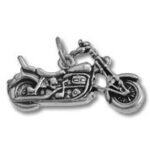 Silver motorcycle charm pendant on white background
