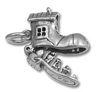 Silver boot charm with tiny house detail