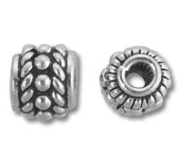 Two ornate silver metal spacer beads